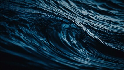 Abstract dark background with flowing blue waves.