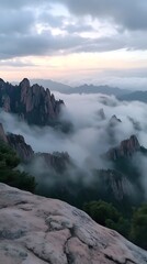 Wall Mural - Majestic Mountain Peaks Enveloped in Mist.