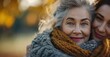 © Infini Craft - Close-up of smiling mature woman with companion in autumn park