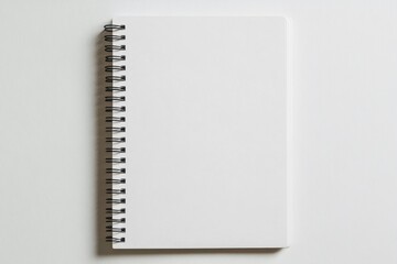 Wall Mural - Blank white spiral notebook on a clean tabletop for creative inspiration and note-taking