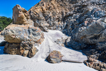 Dramatic rocks at Pfeiffer Beach in Pfeiffer State Park in Big Sur, California.