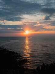 Wall Mural - Sunset Over the Ocean with Reflection