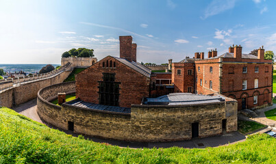 Wall Mural - A view from the castle battlements towards the old disused Victorian prison buildings in Lincoln, Lincolnshire in summertime