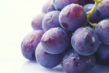 Wall Mural - juicy grapes on a clean, bright white background. The focus is on the vibrant purple and green colors and the detailed texture of the grapes, with even lighting that highlights