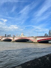 Bridge in europe with a city background and blue sky