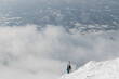 © ADDICTIVE STOCK - Skier preparing to descend in snowy Niseko, Japan