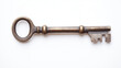 © Steven - An antique metal key on a plain white background, showcasing its intricate design and aged patina.