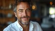 © PaulShlykov - Portrait of a handsome casual businessman smiling