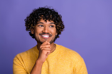 Poster - Photo of interested funny man wear trendy yellow clothes look empty space isolated on violet color background