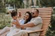© Tina kids photo - happy family is relaxing in the city park