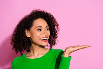 Poster - Photo of pretty lovely woman wear green trendy clothes demonstrate empty space offer isolated on pink color background