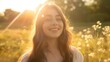 © bvbflo1 - Young happy smiling woman standing in a field with sun