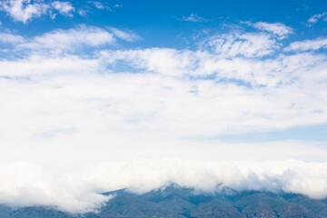 Wall Mural - white cloud on mountains on coast of Lake Sevan