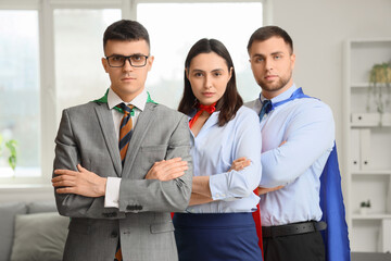 Wall Mural - Business people dressed as superheroes in office