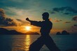 © LimeSky - Wing Chun Fighter silhouette at sea sunset Kwun Sao Form