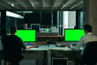 © TamJam/peopleimages.com - Computer, green screen and night with business people in office together for overtime deadline. Back, design and mockup space with employee or designer team in workplace for evening programming