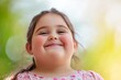 © ChaoticMind - A cheerful child smiles broadly while standing outdoors against a lush green background. The image captures the delight and carefree spirit of childhood in a vibrant setting.