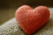 © Moon - Close-up of a handmade knitted heart