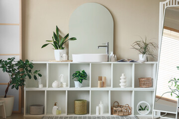 Sticker - Interior of bathroom with sink, shelving unit, houseplants and mirror