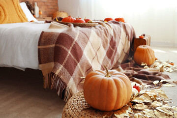 Sticker - Interior of cozy bedroom with big bed and pumpkins