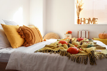 Canvas Print - Interior of modern bedroom with pumpkins and autumn decor