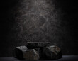 © serhii - composition of stones with texture on dark background for podium