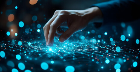 Wall Mural - a hand is touching a screen with a blue background