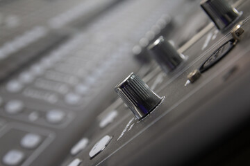 The volume control knob of a digital audio mixer.