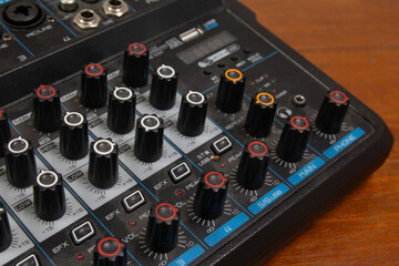 The volume control knob of a digital audio mixer.