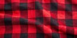 © kansak01 - Softly rustling red and black plaid flannel shirt fabric features a timeless blend of subtle texture and classic