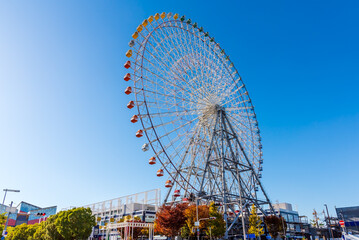 Tempozan Ferris Wheel the Osaka attraction Osaka bay in autumn.