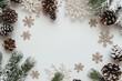 © Gerard - Snow-covered pinecones and snowflakes on white background