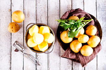 Poster - Potatoes. Bowl with young raw potato