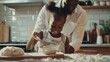 © Usman - Black little girl sieving flour for pastry dough under lovely dad supervision, cooking together at kitchen, copy space