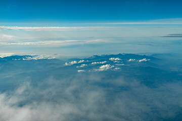 Wall Mural - aerial view of mountain range in fog