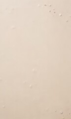 Leinwandbilder - a close-up view of a light-colored surface with small, round, white droplets scattered across it, creating a textured and abstract appearance.