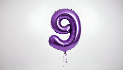 A large helium balloon in the shape of the number 9, white background