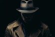 © Yeivaz - Mysterious Detective in Shadowy Silhouette wears a Fedora Hat and Trench Coat on black background