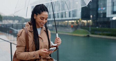 Poster - Woman, outdoor and happy with umbrella on smartphone in rainy weather on social media in Brazil. Female person, employee and smile or laughing online with texting, message and funny notification