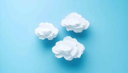 Sticker - Three white paper clouds on a light blue background.