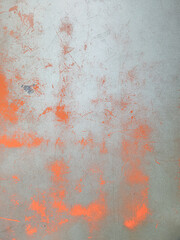 Orange stain background on old metal table. Texture of iron table with traces of rust. Grunge vintage texture background.