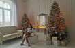 © Angelov - Beautiful holdiay decorated room with Christmas tree with presents under it