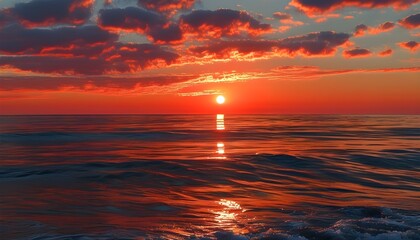 Vibrant Sunrise Over an Orange Ocean Horizon Under a Vast Red Sky