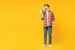 © ViDi Studio - Full body young happy man wears red checkered shirt casual clothes hold in hand megaphone scream announces discounts sale Hurry up isolated on plain yellow orange background studio. Lifestyle concept.