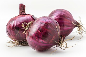 Fresh red onions on a clean white surface