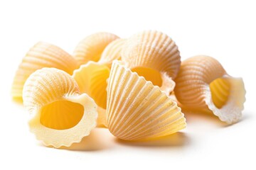 A collection of bright yellow shells arranged on a clean white surface