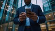 © Studio Nova - The Businessman Using Smartphone