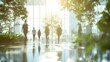 © sungedi - Silhouettes of People Walking Through a Glass Wall with Sunlight and Greenery