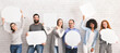 © Prostock-studio - Everyone has own opinion. Group of millennial people holding empty white speech bubbles, free space