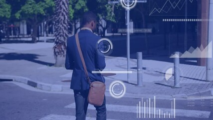 Poster - Businessman walking on street with data analytics and graphs over animation